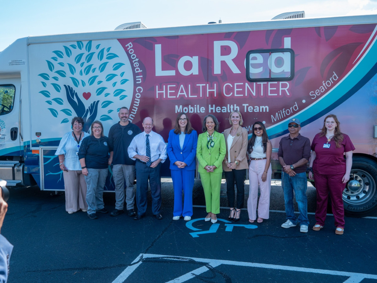 U.S. Rep. McBride outside the Mobile Health Unit at La Red Health Center