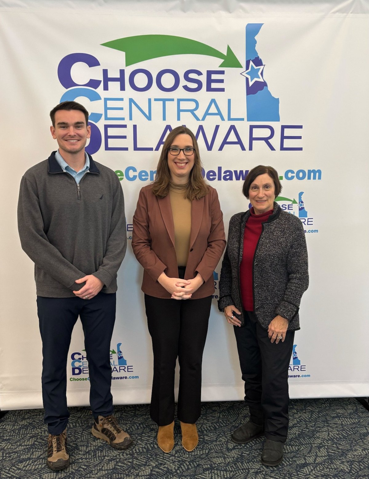 Rep. McBride stands with leaders from the Kent Economic Partnership (KEP).