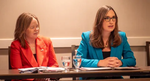Lt. Gov. Kyle Evans Gay and Rep. Sarah McBride sitting at a table during the American Fintech Council Policy discussion