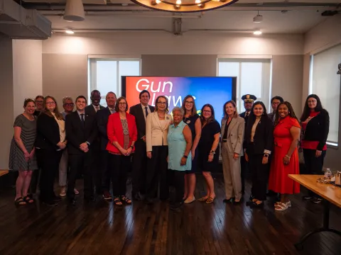 Roundtable participants, including Rep. McBride and Rep. Giffords, take a group photo.