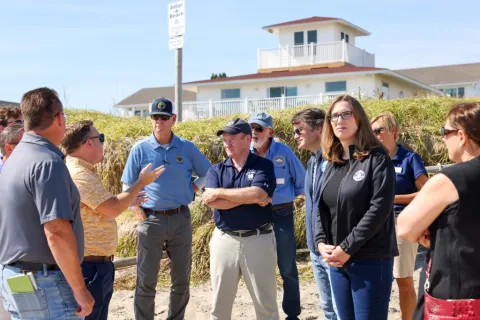 Rep. McBride tours the damage with federal, state, and local partners